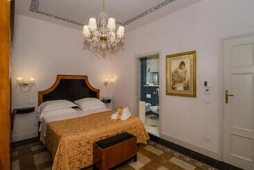 تختخواب و صبحانه Lucca In Azzurro Maison De Charme