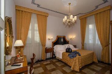 تختخواب و صبحانه Lucca In Azzurro Maison De Charme