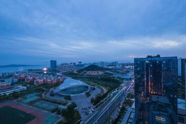 هتل Howard Johnson Kangda Plaza Qingdao