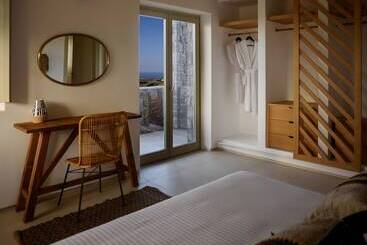 هتل Este Luxury Suites
