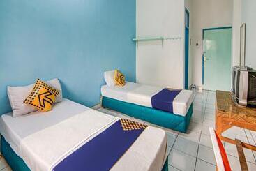 Spot On 90964 Hotel Margadana
