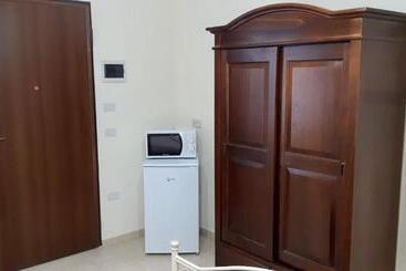 تختخواب و صبحانه Lu Masunu