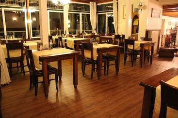 בית מלון כפרי Cafe Restaurant Duinzicht