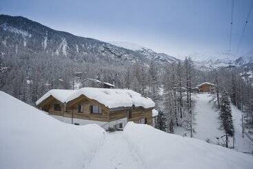 هتل Mountain Exposure Luxury Chalets & Penthouses & Apartments