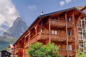 هتل Mountain Exposure Luxury Chalets & Penthouses & Apartments
