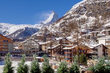 هتل Mountain Exposure Luxury Chalets & Penthouses & Apartments
