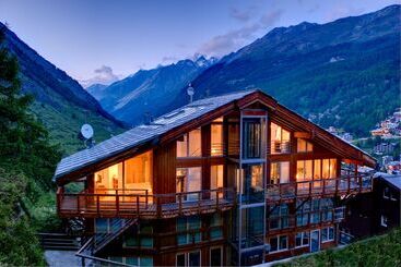 هتل Mountain Exposure Luxury Chalets & Penthouses & Apartments