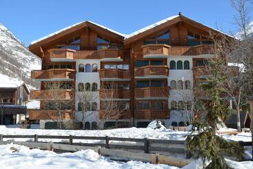 هتل Mountain Exposure Luxury Chalets & Penthouses & Apartments