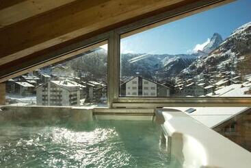 هتل Mountain Exposure Luxury Chalets & Penthouses & Apartments