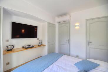 تختخواب و صبحانه Le Refuge Gigaro Lodges