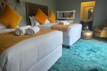 تختخواب و صبحانه Ndaba Golf Lodge & Hello Beautiful Day Spa