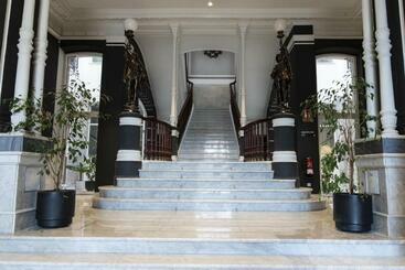 هتل Soho Boutique Palacio De Pombo