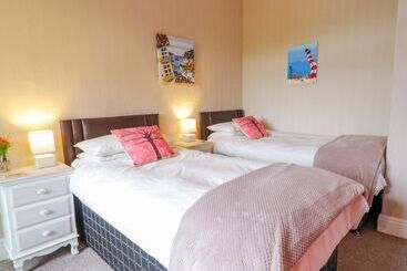 بيت ريفى Cartref Melus