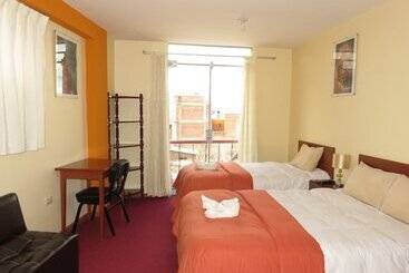 تختخواب و صبحانه Tikary Puno Inn