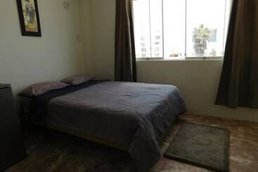 هتل Nuna Chak Hostel & Café
