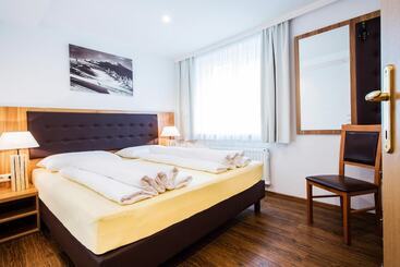 هتل Neue Post Apartments