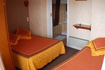 هتل Hôtel Au Jardin St Michel