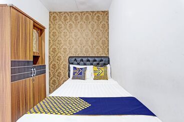 هتل Spot On 91521 Mayong Guesthouse