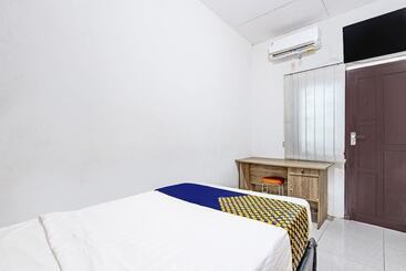 هتل Spot On 91521 Mayong Guesthouse