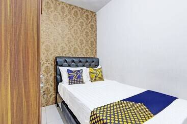 هتل Spot On 91521 Mayong Guesthouse