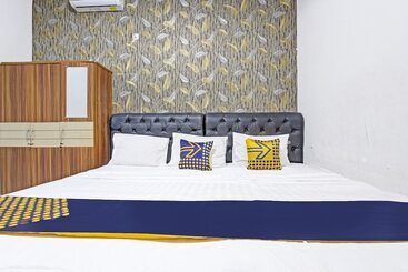 هتل Spot On 91521 Mayong Guesthouse