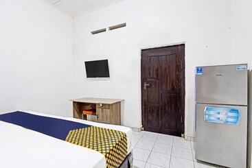 هتل Spot On 91521 Mayong Guesthouse