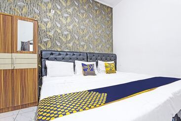 هتل Spot On 91521 Mayong Guesthouse