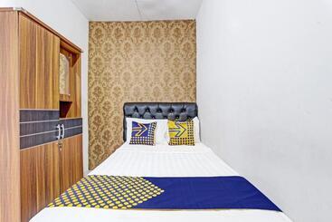 هتل Spot On 91521 Mayong Guesthouse