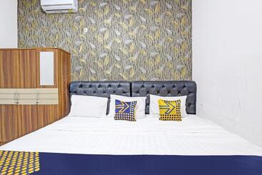 هتل Spot On 91521 Mayong Guesthouse