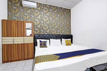 هتل Spot On 91521 Mayong Guesthouse