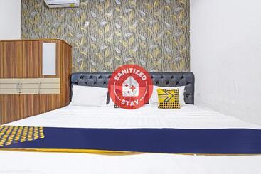 هتل Spot On 91521 Mayong Guesthouse