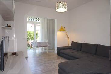 Cosy Two Storey Villa With A Garden And A Shared Swimming Pool