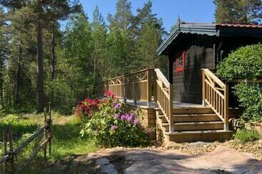 펜션 Timber Cottages With Jacuzzi And Sauna Near Lake Vänern