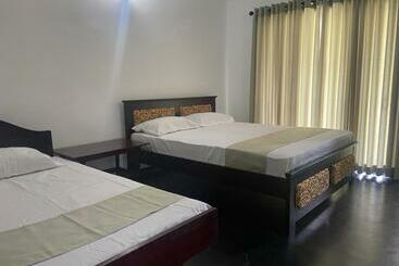 تختخواب و صبحانه Rikton Bungalow