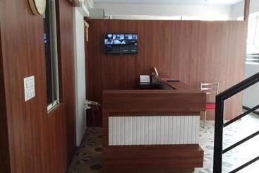 هتل New Shelton Suites
