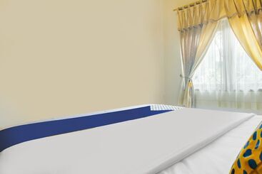 هتل Spot On 91620 Skypiea Guest House
