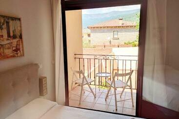 Жильё для туристов Gredosrentals   Apartamento Castillo