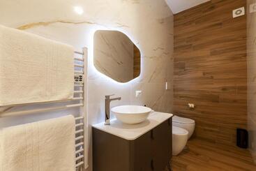 تختخواب و صبحانه Cas’ A Mare   Beachfront Luxury Suites