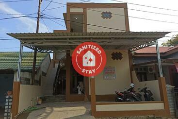 هتل Spot On 91249 Baroqah Guest House