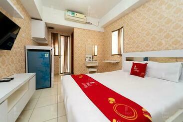 هتل Redliving Apartemen Green Lake View Ciputat Farida Property 2 Tower E