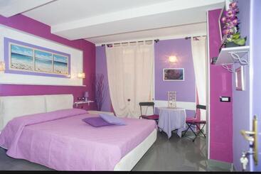 تختخواب و صبحانه I Coralli Rooms & Apartments