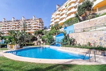 Spacious 2 Bedroom Apartment In Puerto Banus With A Private Terrace And Mountain Views