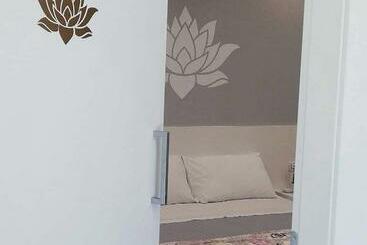 تختخواب و صبحانه Fiore Di Loto Rooms