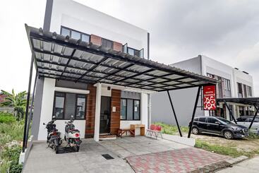 هتل Oyo 90688 Marta Residence