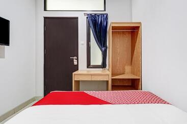 هتل Oyo 90688 Marta Residence