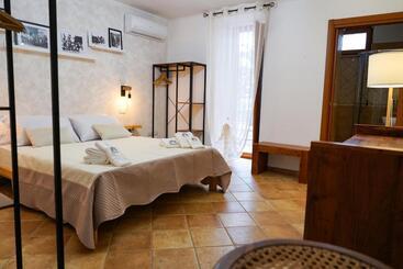تختخواب و صبحانه Familiainn Rooms & Apartments