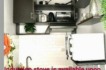 Cozy And Full Service Condo At The Heart Of Bacolod