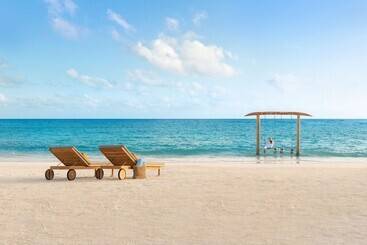 هتل Hilton Maldives Amingiri Resort & Spa