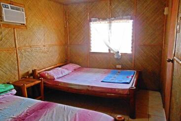 استراحتگاه Pareja Tourist Inn