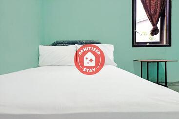 هتل Spot On 91791 Homestay Surya Syariah
